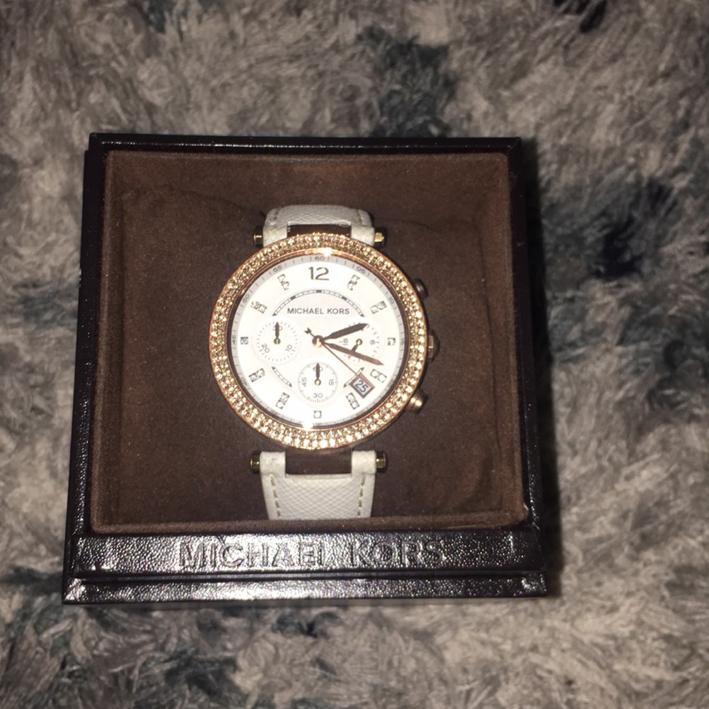 Rose gold and white Michael Kors watch